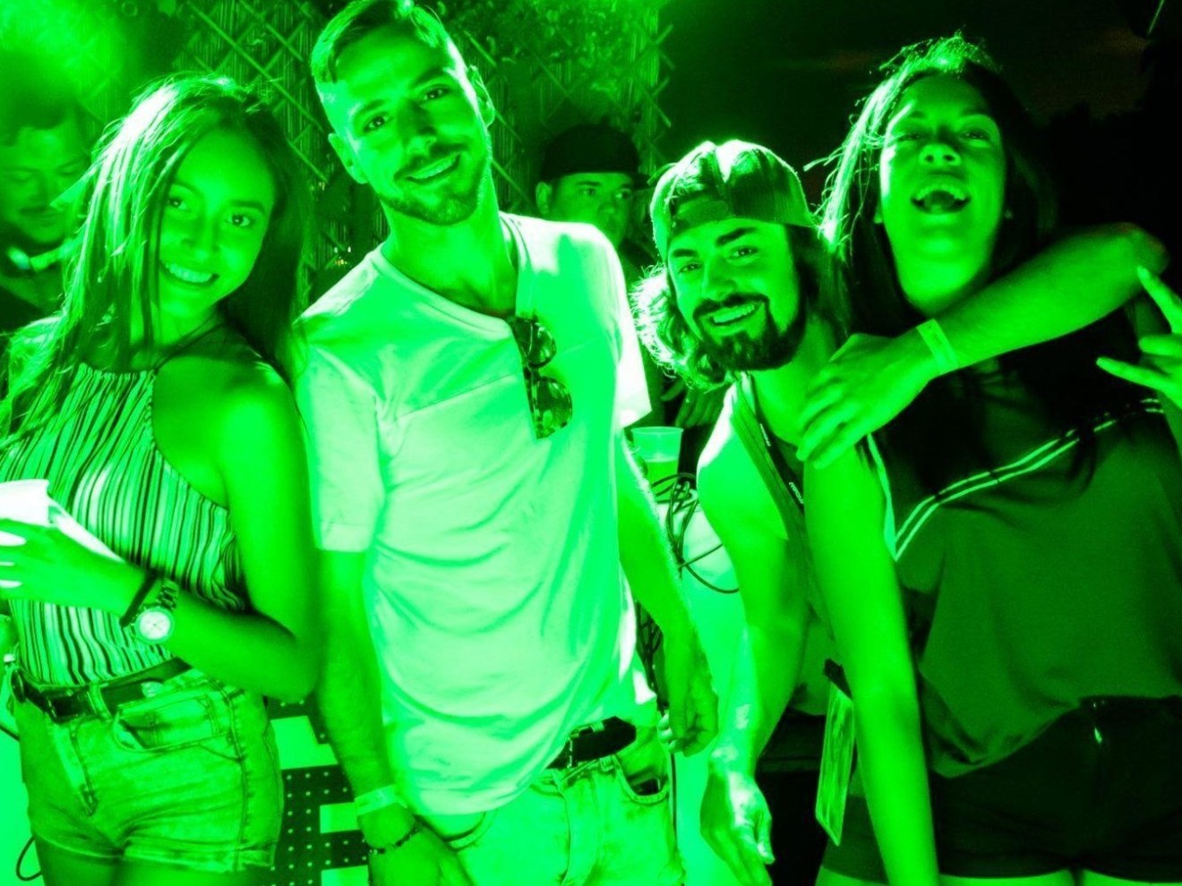 a group of people posing for the camera