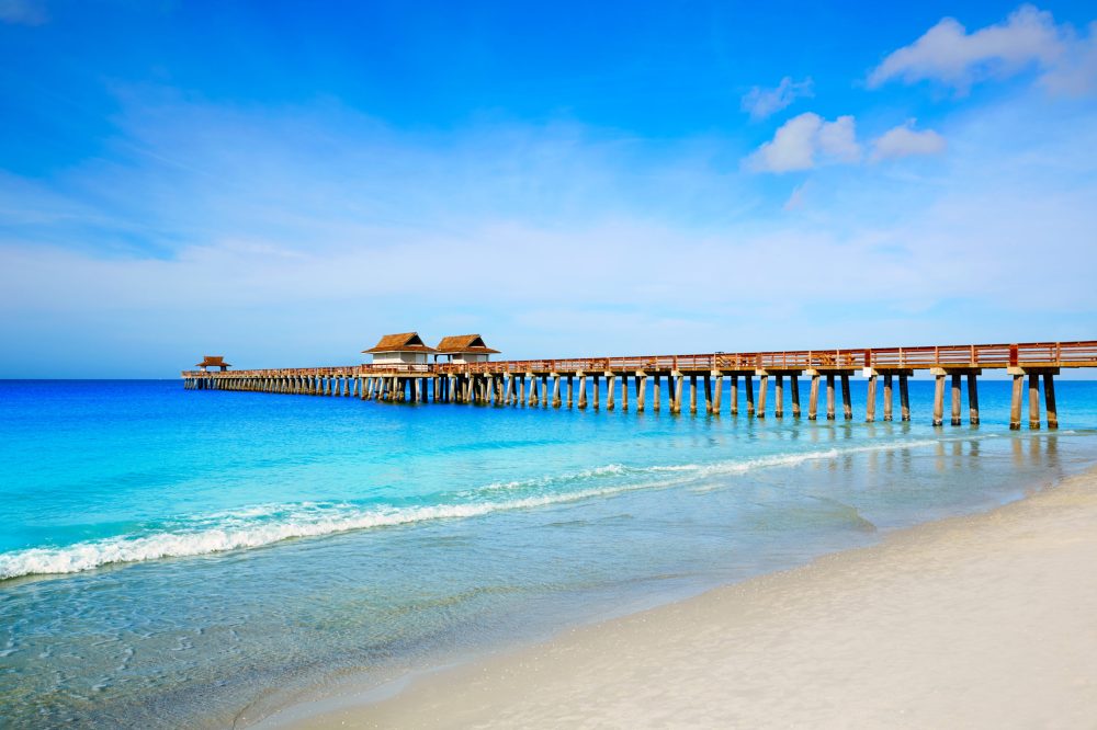 Naples Pier and beach in florida USA sunny day